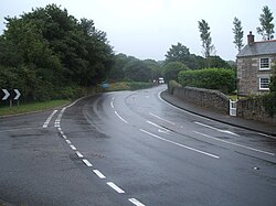 Bend of the A393 in Comford