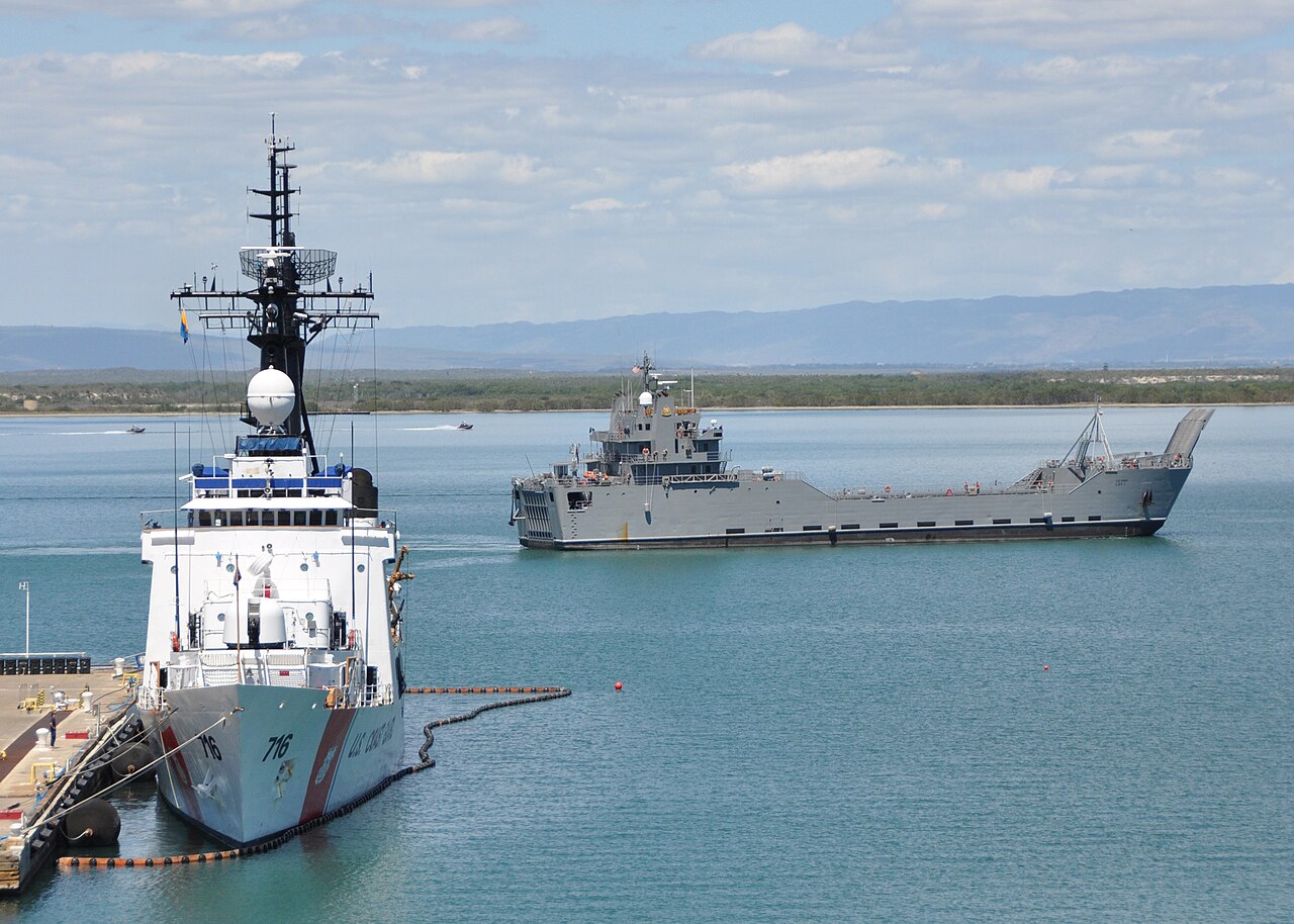 US Navy 100308-N-8241M-005 The U. S. Army logistics support vessel General Frank S. Besson, Jr. (LSV 1) passes the U.S. Coast Guard cutter Dallas (WHEC 716) as it arrives at Naval Station Guantanamo Bay, Cuba.jpg