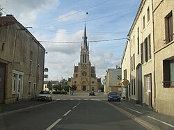 The church and surroundings in Douzy