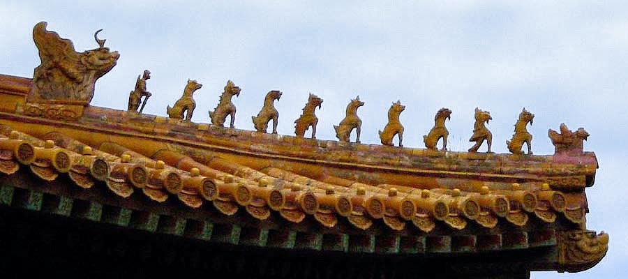 Ceramic figures decorating the Hall of Supreme Harmony at the Imperial Palace Museum. The 9 mystical beasts indicate the highest status in the empire for this building.