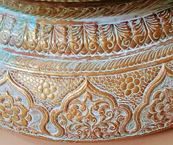 copper object with copper carbonate on its surface