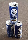 A stacking of Australian cans of Double Espresso variety Boss Coffee