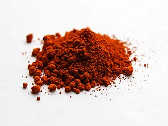 Alizarin was the first synthetic red dye, created by German chemists Carl Graebe and Carl Liebermann and head chemist Heinrich Caro in 1868 through the chemical company Badische Anilin-und Soda-Fabrik (BASF).[25] It duplicated the colorant in the madder plant, but was cheaper and longer lasting. After its introduction, the production of natural dyes from the madder plant virtually ceased.