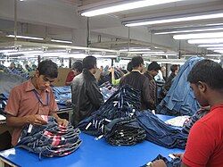The final steps of preparing jeans for market