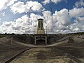 Flame pit with a mobile gantry