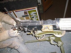 View of the breech of a Vickers gun showing brass feed ramp.