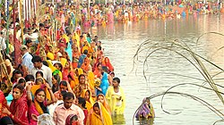 Devotees gathered at a pond to worship the sun god Surya and his sister Chhathi Maiya in Janakpurdham, Madhesh Province, Nepal