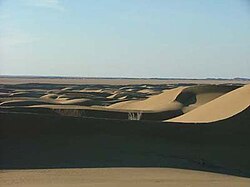 A view of the sand dunes of the Rig-e Jenn
