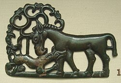 Bronze Ordos culture plaque, from the eastern end of Scythian art, 4th century BC; a deer attacked by a wolf