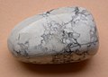 A polished mass showing veining.