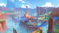 Aerial view of the Stadium of the Sacred Flame, capital city of the fictional nation of Natlan