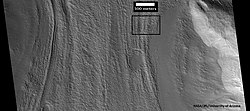 Context picture showing origin of next picture. The location is a region of lineated valley fill. Image from HiRISE under HiWish program.