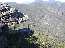 Left: View of the Balconies rock formation, formerly known as the Jaws of Death since it appears to be an open mouth of two rock slabs with a hiker standing inside