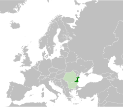 Dobruja (dark green) within Bulgaria and Romania (light green), both in Southeast Europe.