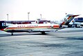 A Boeing 727-100 in the "Flying Papaya" livery in 1980