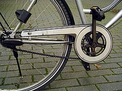 Partially enclosed chain case