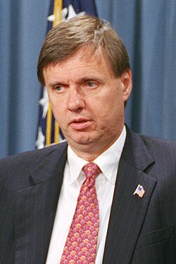Official portrait of Timothy J. Muris wearing a suit and tie