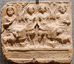 Bas-relief of four human-looking gods
