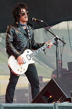 Conte performing at the 2011 Ilosaarirock festival with Michael Monroe band