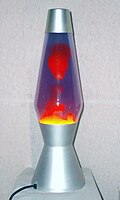 D. Lava lamp with interaction between dissimilar liquids: water and liquid wax
