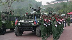 UWSA female soldiers stand at attention during ceremonies