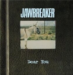 The front cover of a photo album with a picture of a horse in the centre