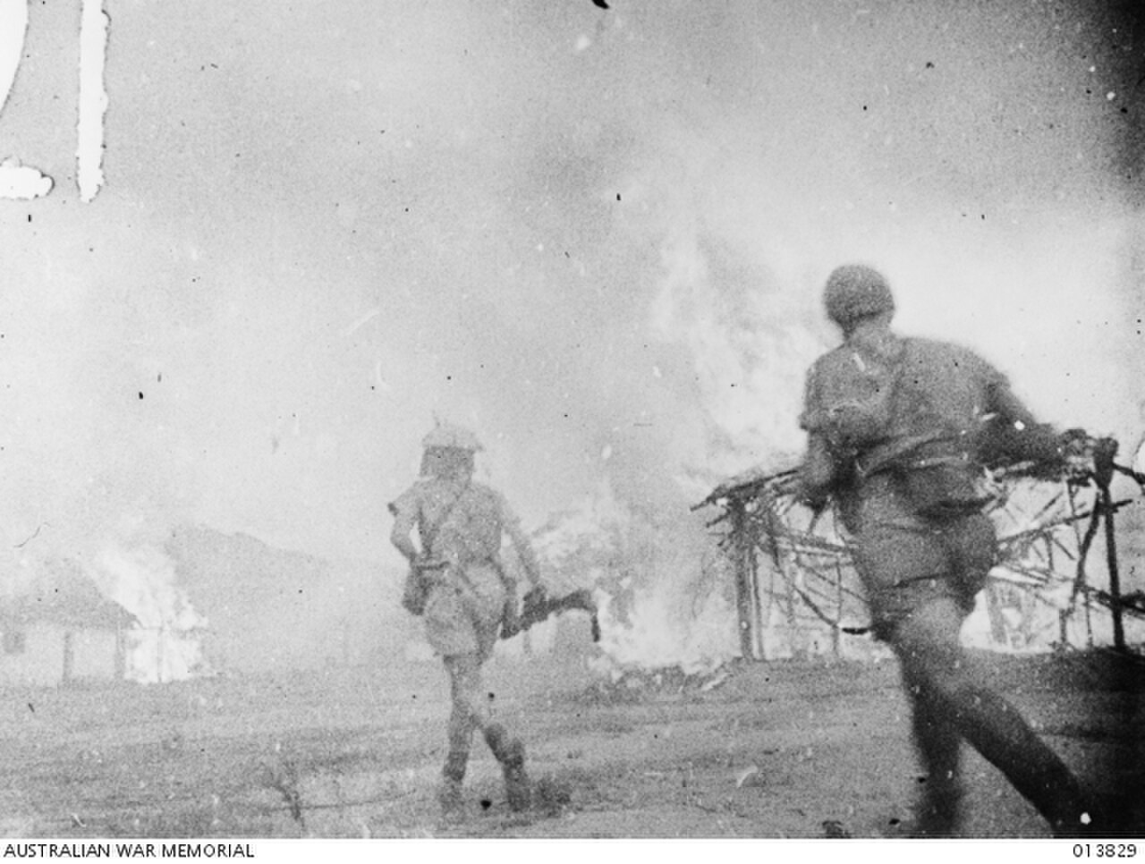 Native village burning.jpg