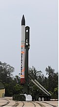 HSTDV cruise vehicle mounted atop a solid booster stage before launch.