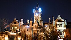 Frankenstein Manor at night with electrical effects in windows
