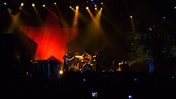 Stage with a black flag and red star