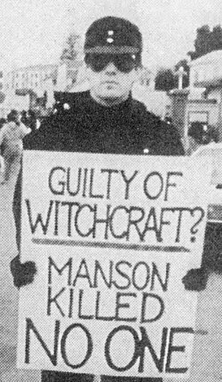 Rice at a protest in support of Charles Manson in 1989