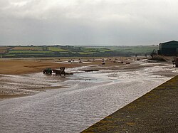 Dredging sand from the nearby Town Bar using a tractor