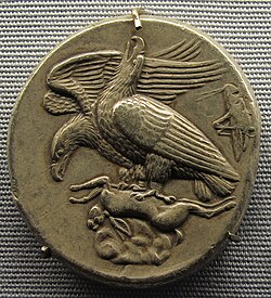 Ancient Greek tetradrachm coin, 410 BC, with grasshopper at right