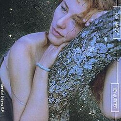 "Hey Jupiter" U.S. EP cover art featuring Tori Amos staring into the distance leaning on a tree branch