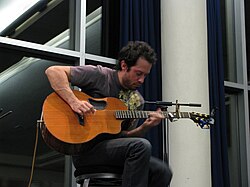 Bundy performing with multiple capos