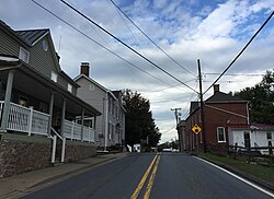View west along Maryland State Route 107 (Fisher Avenue) at Norris Road