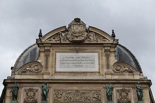 Baroque Revival pediment of the Fontaine Saint-Michel, Paris, by Gabriel Davioud, 1858[24]