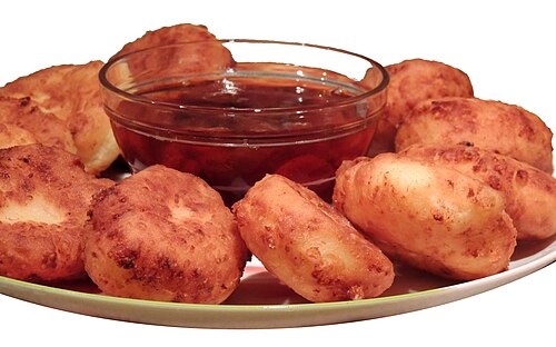 Syrniki served with varenye