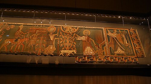 Romanesque meander of a tapestry with Saint Michael fighting with the dragon, 1146-1155, linen yarn, wool, linen, Halberstadt Cathedral Treasure, Halberstadt, Germany[9]