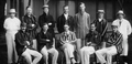 Group of men wearing striped shirt for cricket club photo group