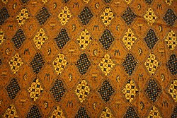 Contemporary inland batik from Solo, Indonesia, with sidha drajat pattern.