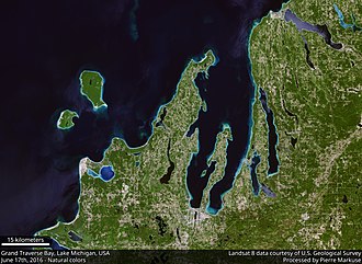 Close-up satellite view of the Grand Traverse Bay, oriented with north at the top. Note the East and West arms of the bay, divided by the Old Mission Peninsula.