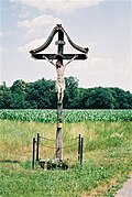 A Latin crucifix with a stylized INRI plaque attached, in cornfields near Mureck, Styria, Austria