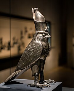 Ancient Egyptian figurine of Horus as falcon god with an Egyptian crown; c. 500 BC; silver and electrum; height: 26.9 cm; Staatliche Sammlung für Ägyptische Kunst (Munich, Germany)