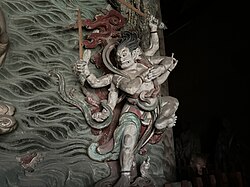Yuan dynasty (1271-1368) figure of a Wisdom King, one out of a pair flanking a central figure of Guanyin, at Fusheng Temple[zh] in Yuncheng, Shanxi, China