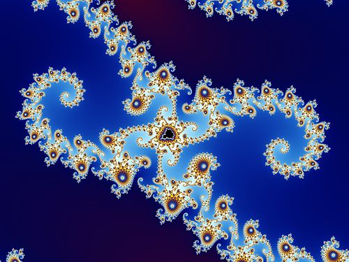 Satellite. The two "seahorse tails" (also called dendritic structures)[69] are the beginning of a series of concentric crowns with the satellite in the center.