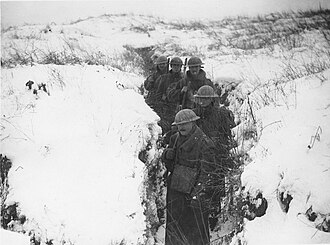 Soldiers in a trench on the Western Front in World War I in winter.