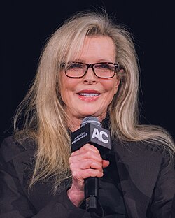 Basinger smiling