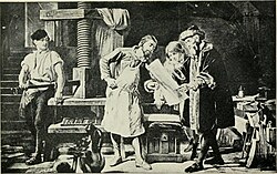 Drawing of Johannes Gutenberg standing beside a printing press, holding a printed sheet