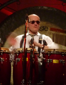 Cooper on tour with Elton John in January 2010 at a concert in Hawaii